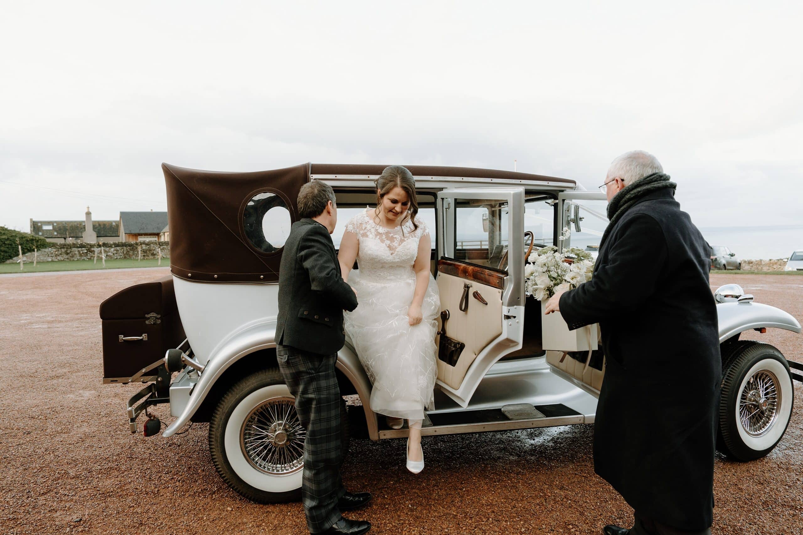 kinkell byre wedding photos classic vintage car taking bride to wedding ceremony