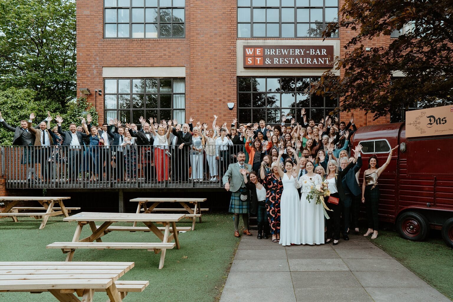 picture of brides and all wedding guests outside of brewery west on the green wedding glasgow
