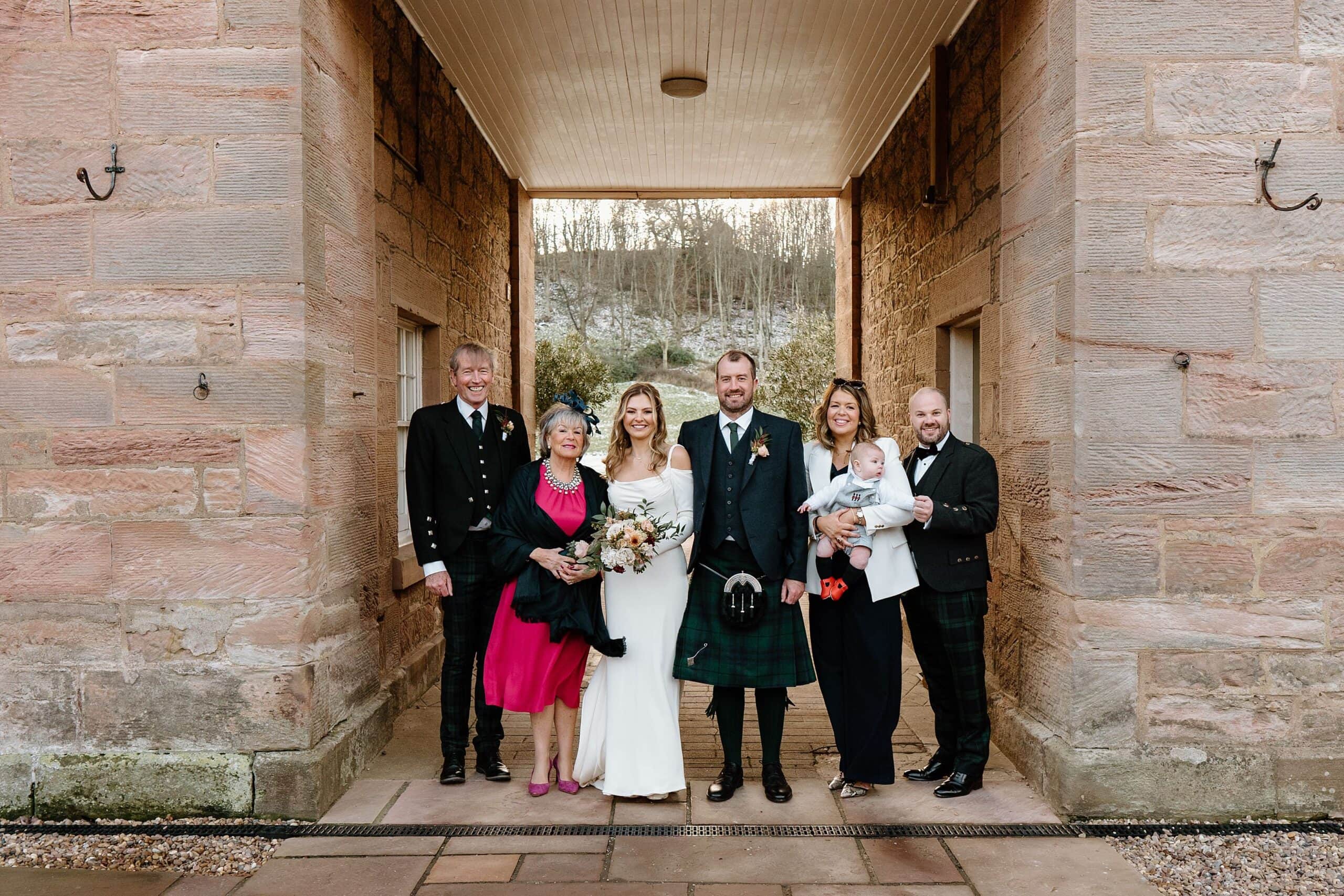 external outside view of dunglass estate wedding photos of courtyard scotland with family portraits