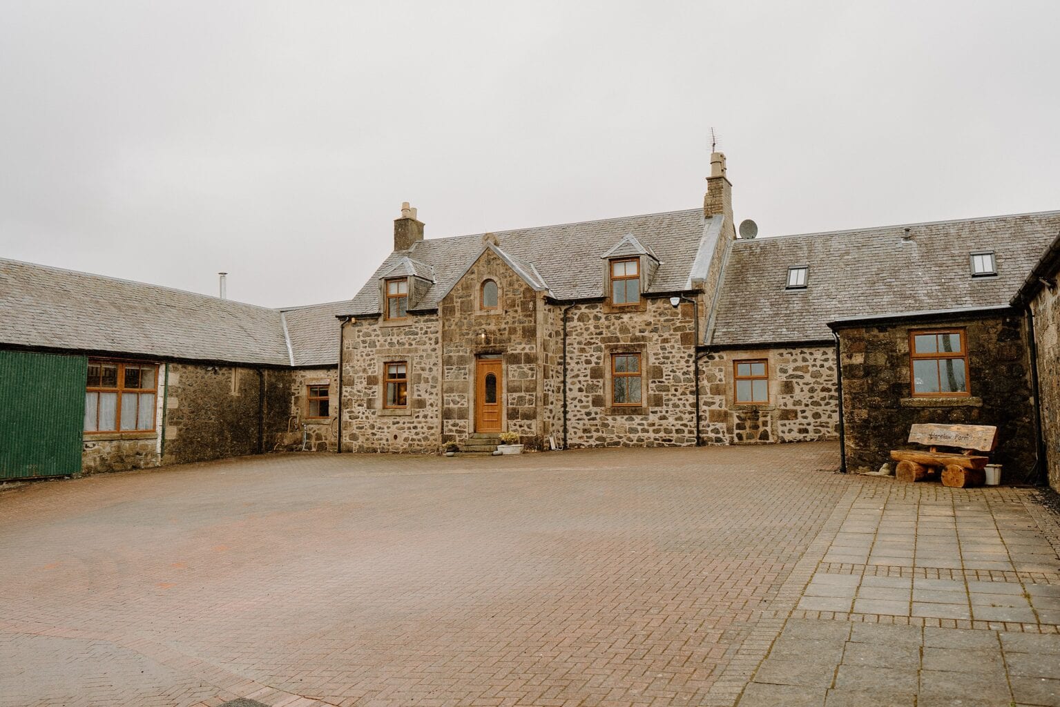 exterior outside view of harelaw farm wedding venues scotland on a cloudy spring day