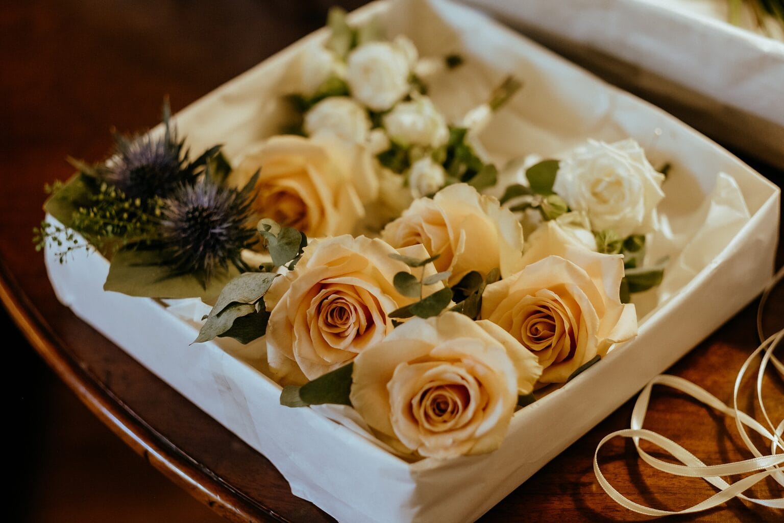 box of floral buttonholes colstoun house wedding cost unique wedding venue scotland